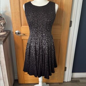 Black and White Sleeveless fit and flare dress.